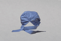 Blue surgical cap with ties